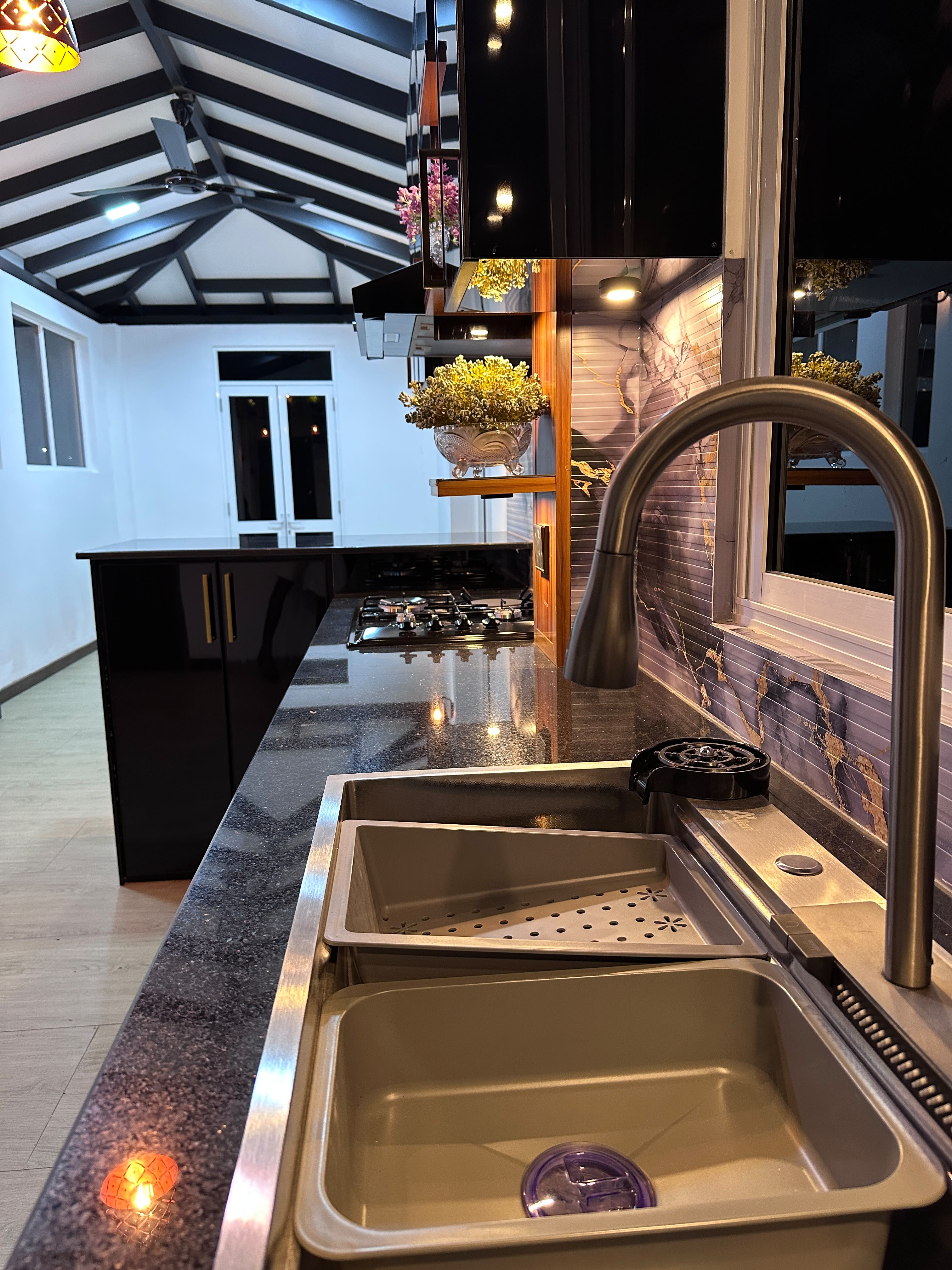 Premium kitchen sink with black granite countertop